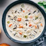 Creamy Chicken and Wild Rice Soup in a bowl ready to be enjoyed.