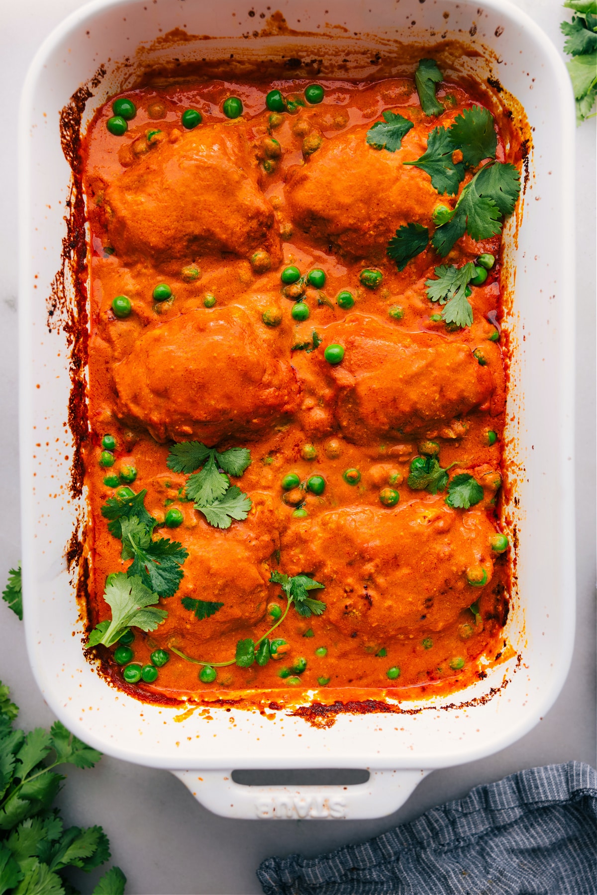 One-pan Tikka Masala freshly out of the oven, warm and covered in delicious sauce.