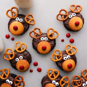 Adorable and delicious cookies decorated to resemble reindeer, making a perfect festive dessert.