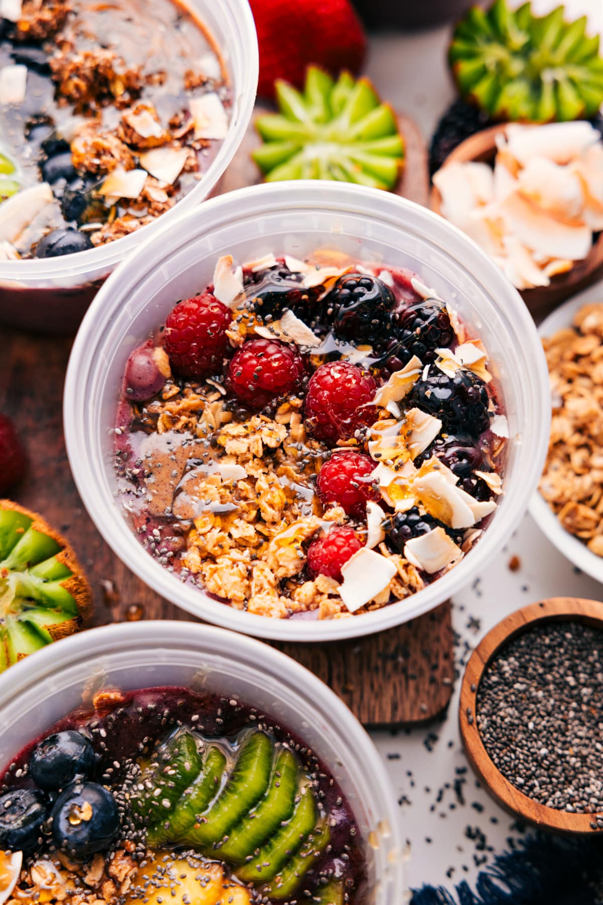 Berry Flavored And Topped Acai Bowl Recipe Berry version of this breakfast topped with granola, berries, chocolate flakes, chia seeds, and honey.