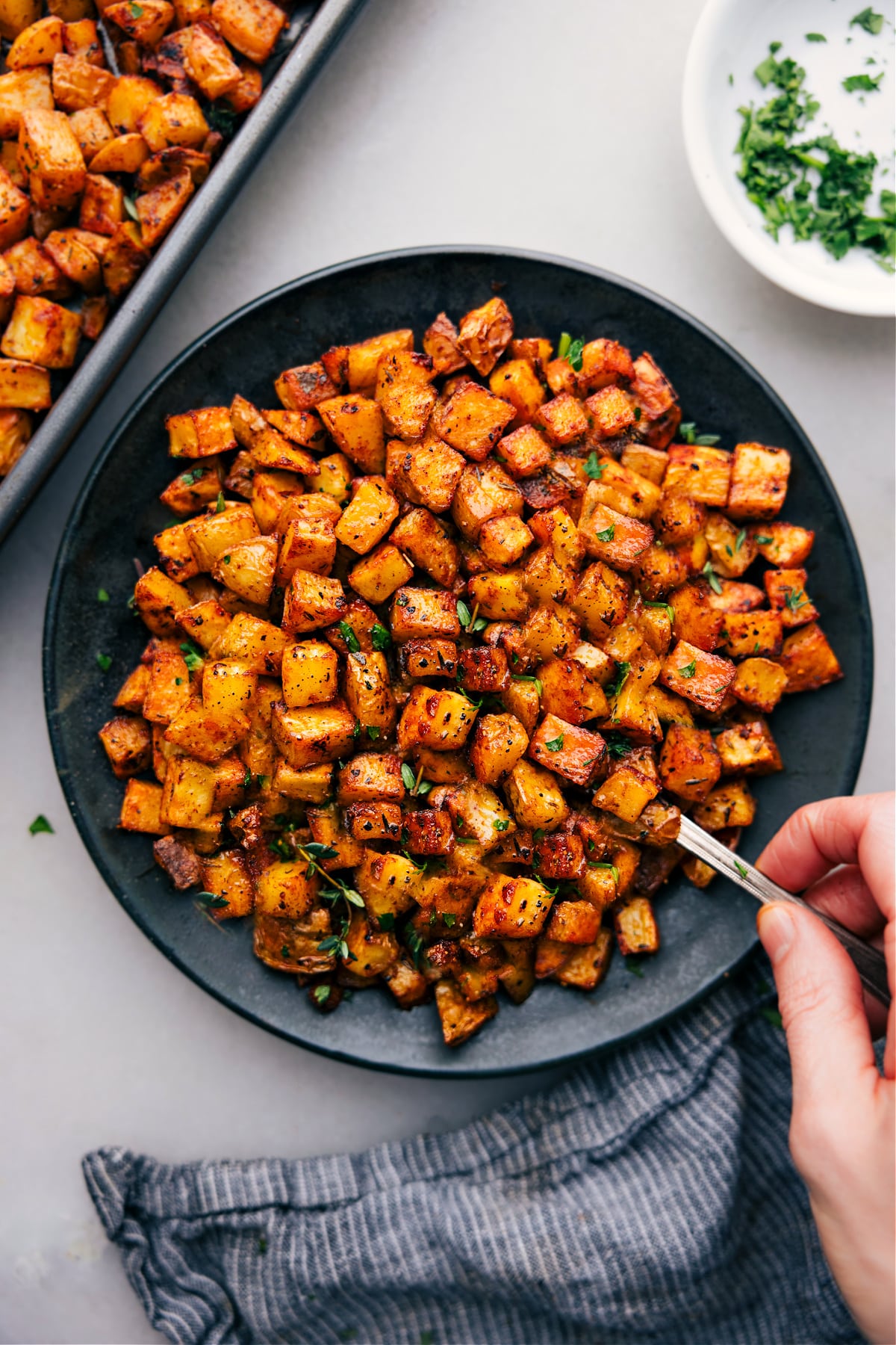 Big plate full of Breakfast Potatoes ready to be enjoyed.