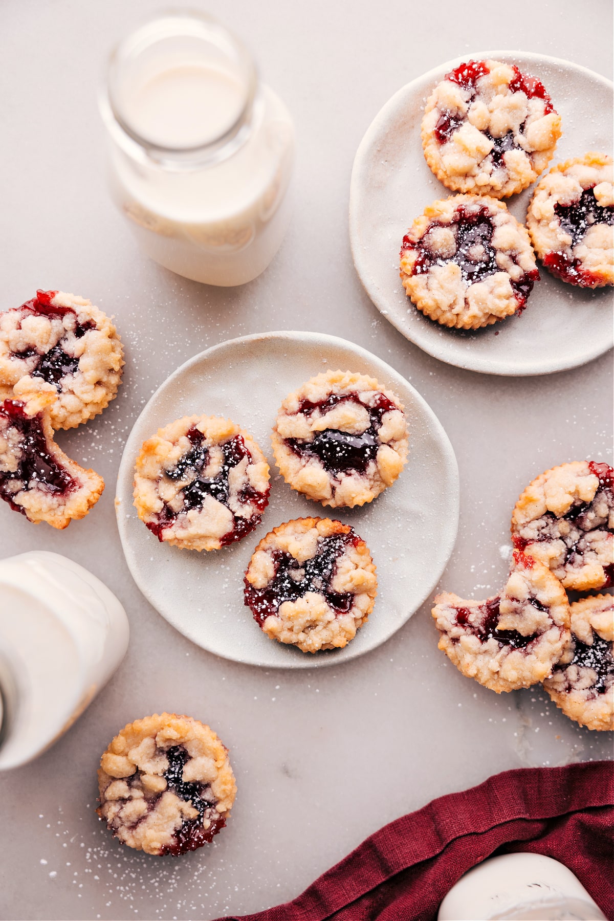 Costco's Raspberry Crumble Cookies spread out on some plates.