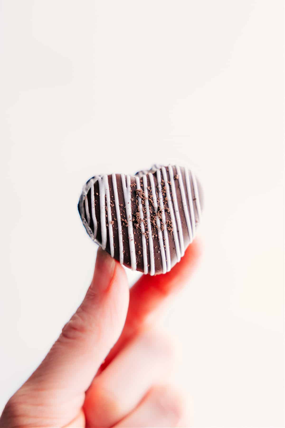 One of the Heart Oreo Truffles being held up.