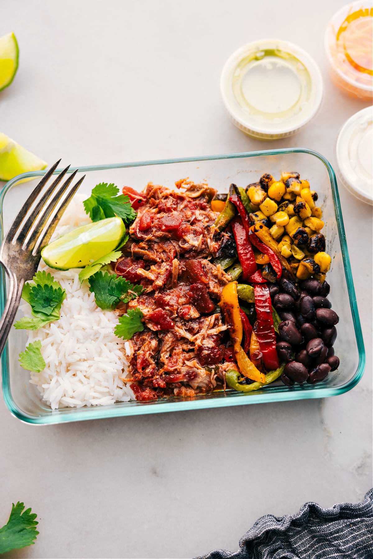 Salsa chicken crockpot prepped out for meal prep.