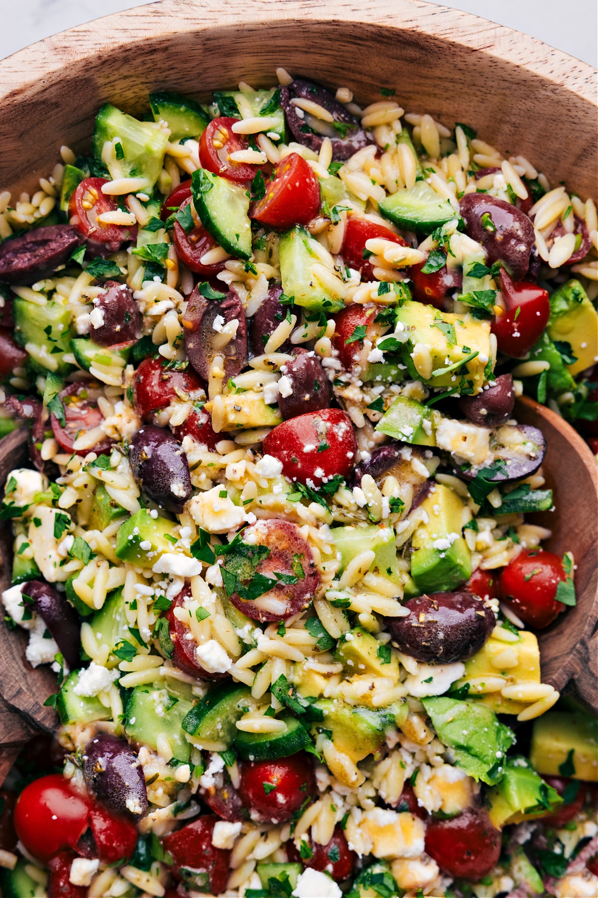 Mediterranean Orzo Salad in a bowl ready to be enjoyed.