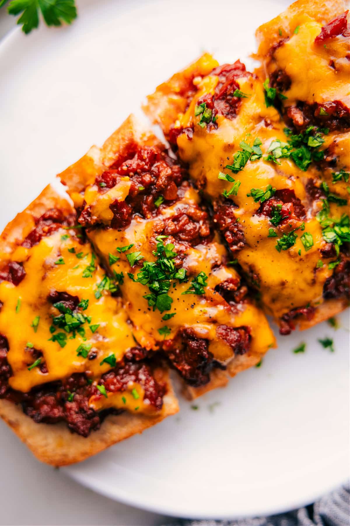 Slices of Sloppy Joe Pizzas on a plate.