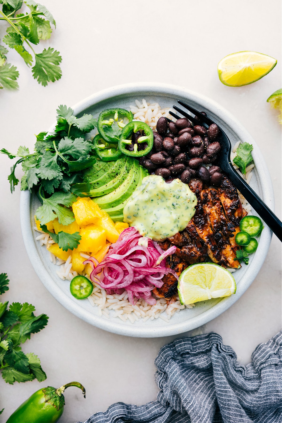 The Best Chicken Rice Bowl Recipe Chicken Rice Bowl in a bowl with all the delicious toppings.