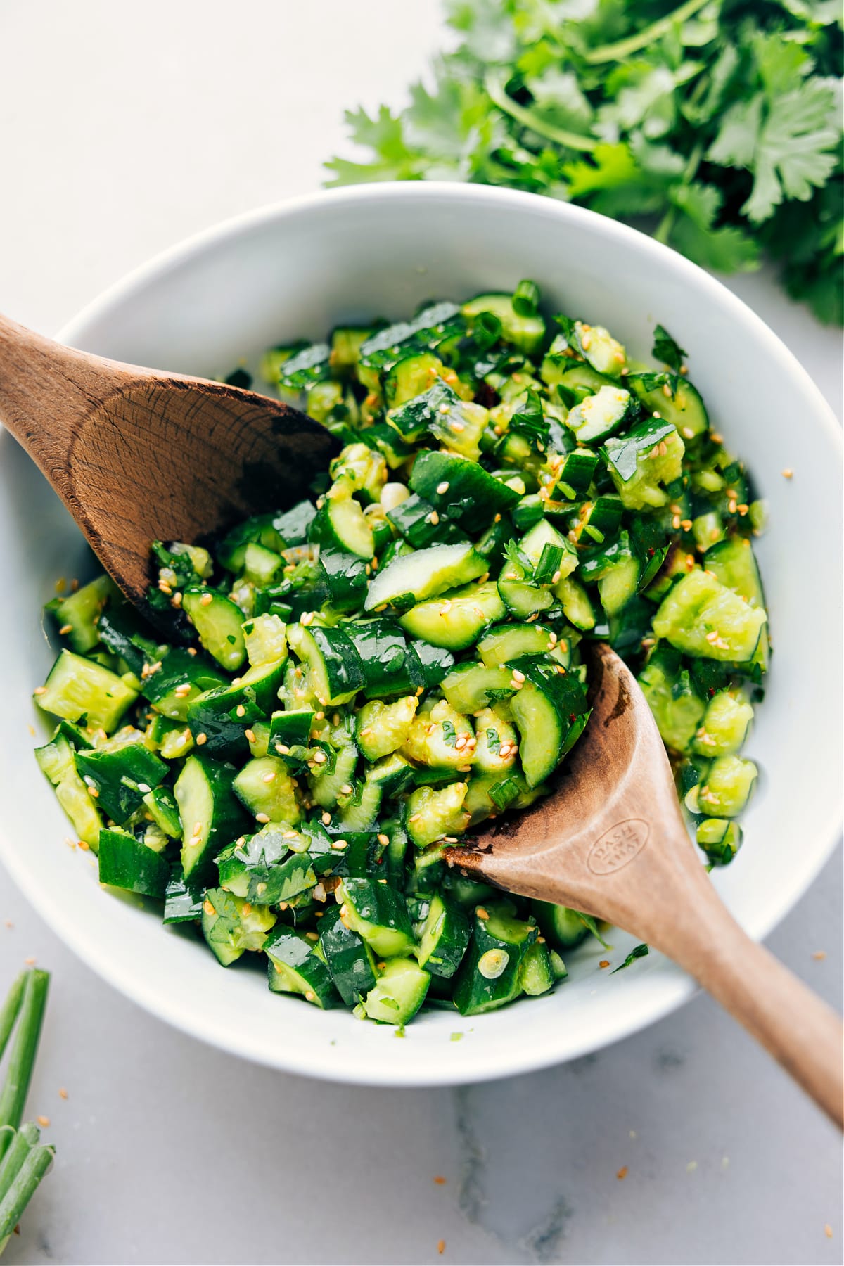 Best Cucumber Salad Recipe Smashed cucumber salad in a bowl dressed and ready to be enjoyed.