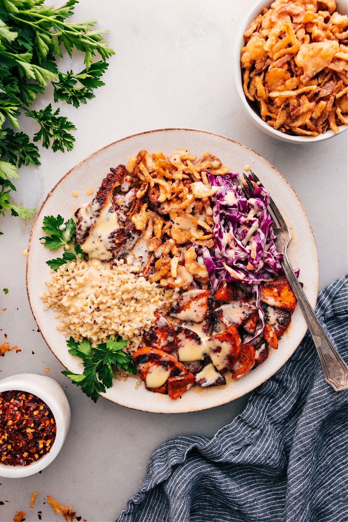 The Best Hot Honey Chicken Bowl Recipe Hot Honey Chicken Bowl topped with dressing, ready to enjoy!