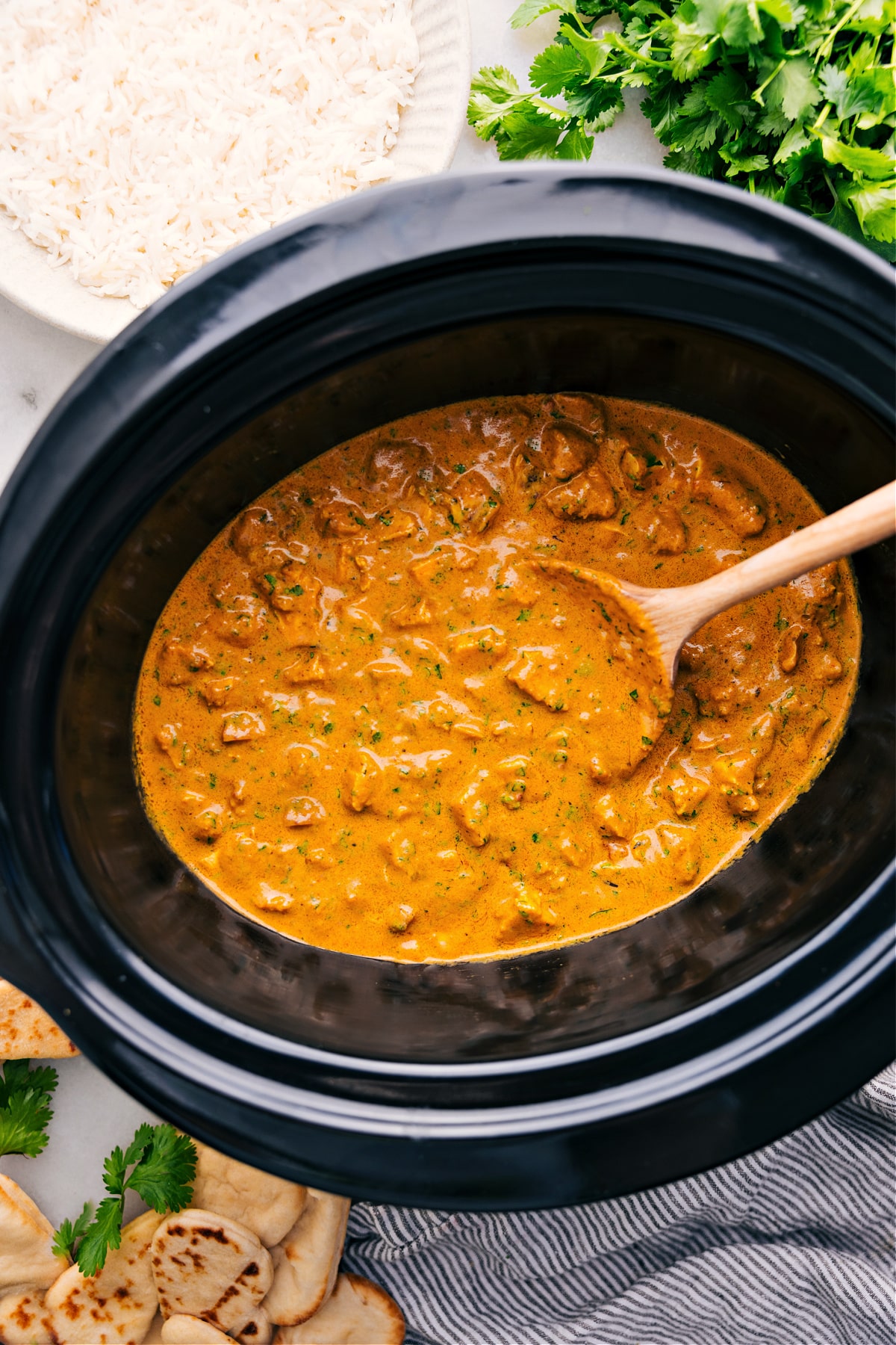 The Best Crockpot Butter Chicken Recipe Crockpot Butter Chicken cooks in the slow cooker and is perfect for serving over a bed of rice.
