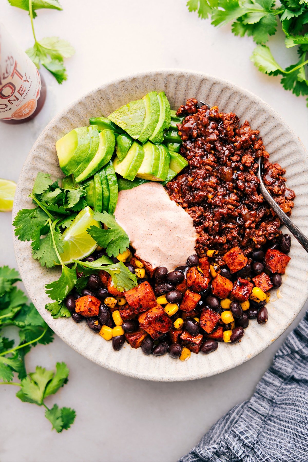 The Best Ground Beef Taco Bowl Ground Beef Taco Bowl with sauce, ready for you to enjoy.
