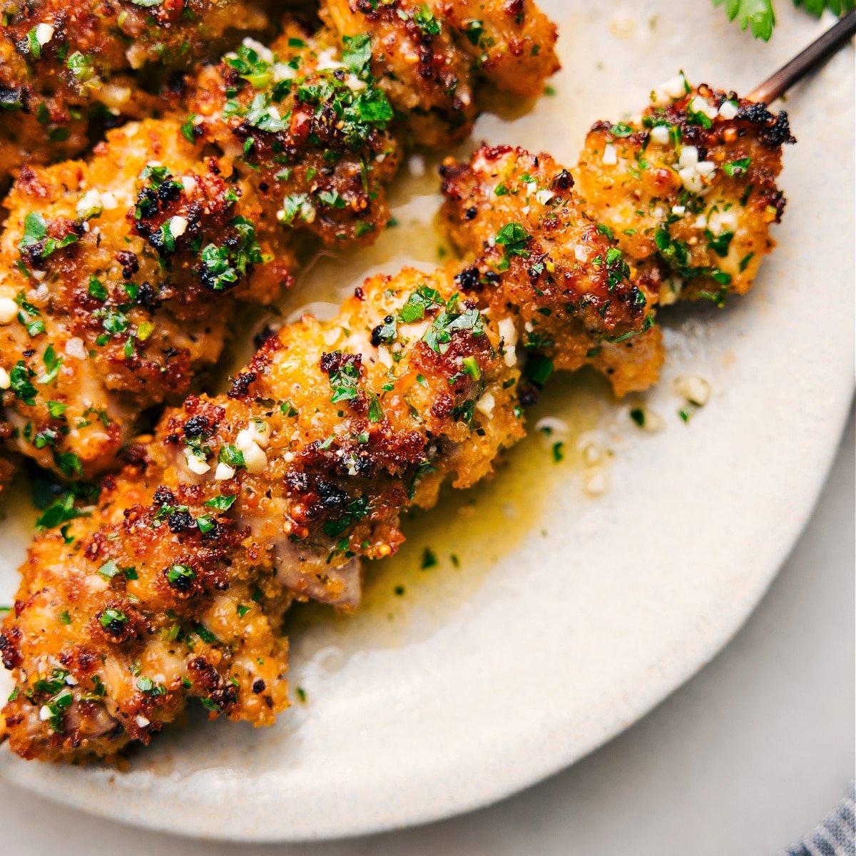 Chicken Spiedini topped with extra marinade and baked until perfectly crispy.