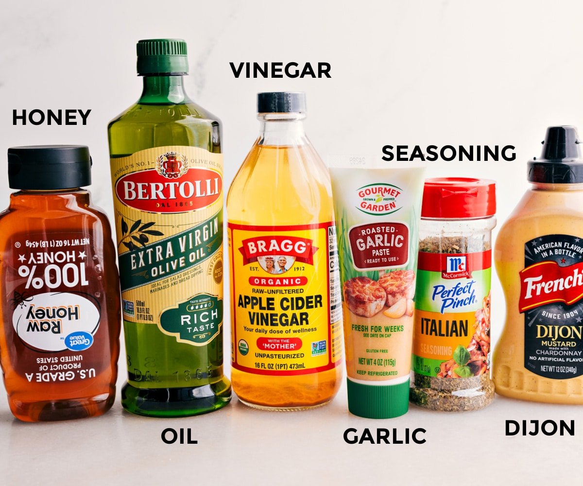 Dijon, seasoning, garlic, apple cider vinegar, oil, and honey—all set to mix into the dressing for this Marry Me Chicken Pasta Salad.