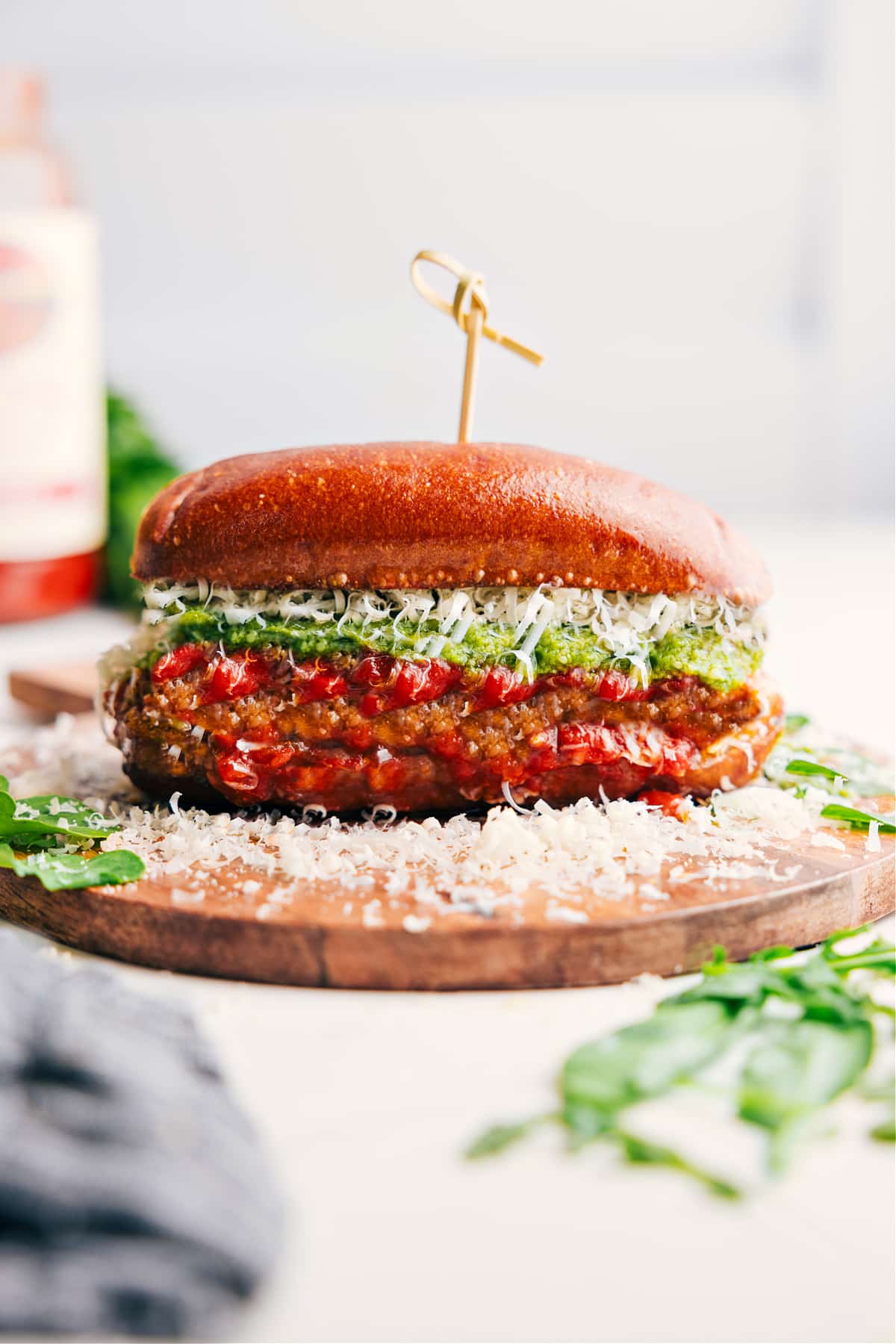 Delicious And Comforting Chicken Parmesan Sandwich Chicken Parmesan Sandwich with fresh parmesan spilling out ready to be enjoyed.