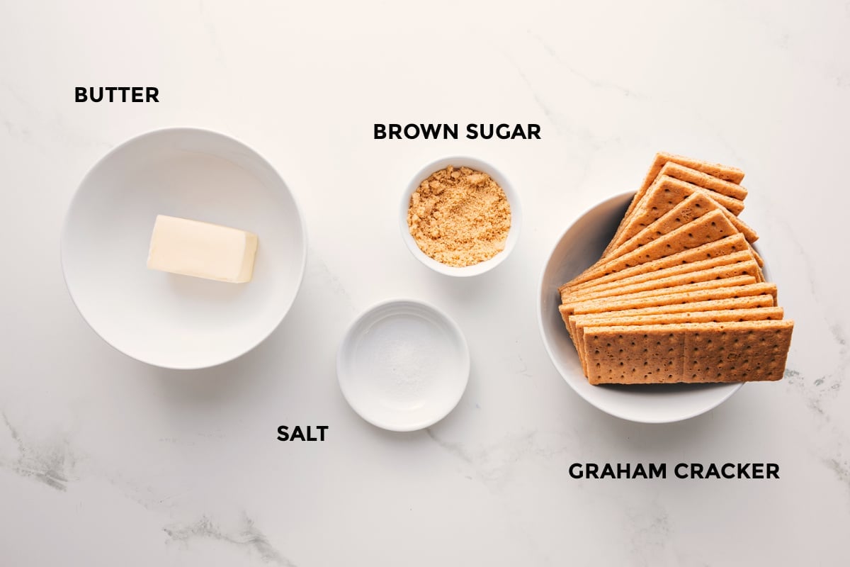 Ingredients In This Graham Cracker Pie Crust Recipe All the ingredients in this recipe prepped out for easy assembly including butter, salt, brown sugar, and graham cracker.