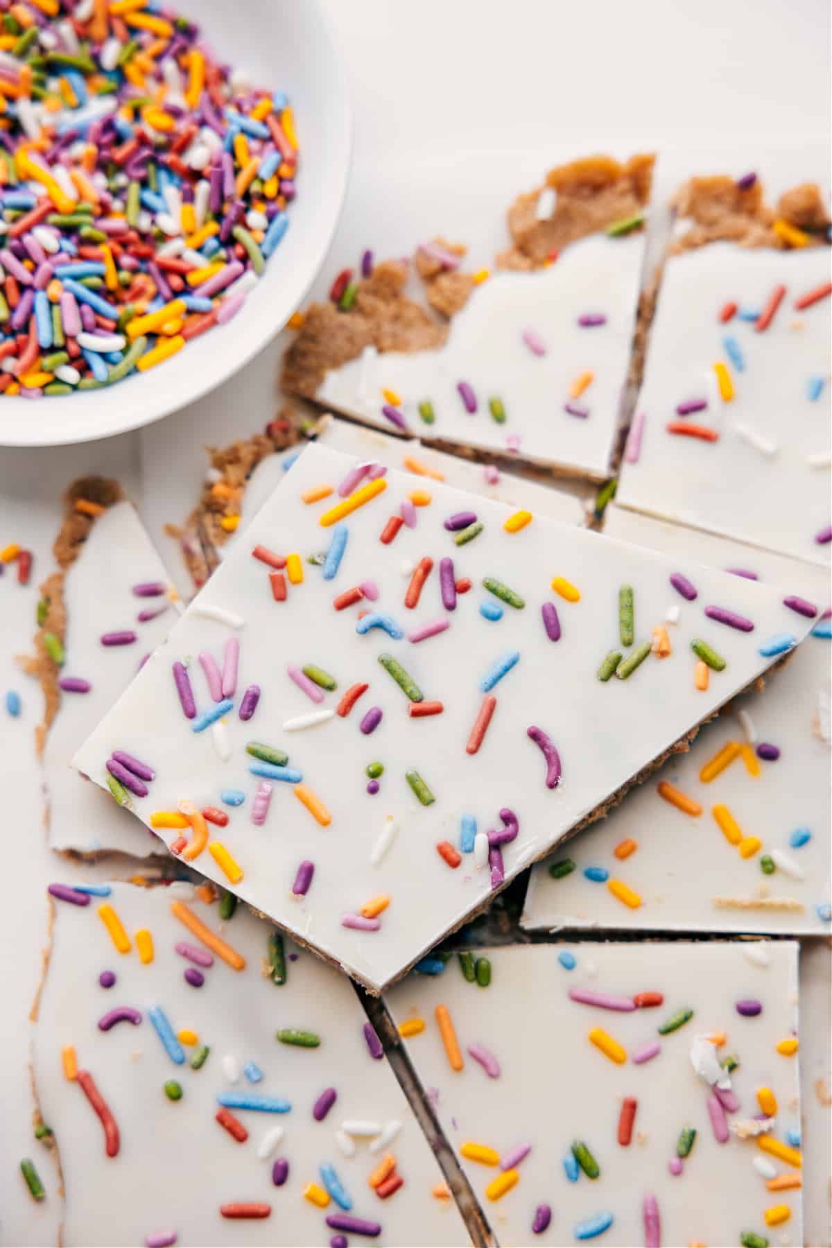 Healthy And Delicious Cake Batter Bark Healthy Cake Batter Bark with white chocolate on top and sprinkles.