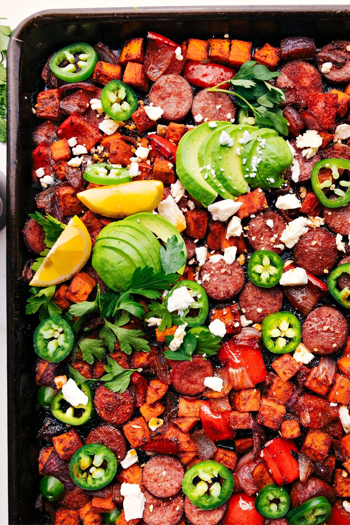 Simple And Delicious Sheet Pan Hot Honey Sausage And Veggies Sheet pan hot honey sausage and veggies, fresh from the oven, sprinkled with feta.