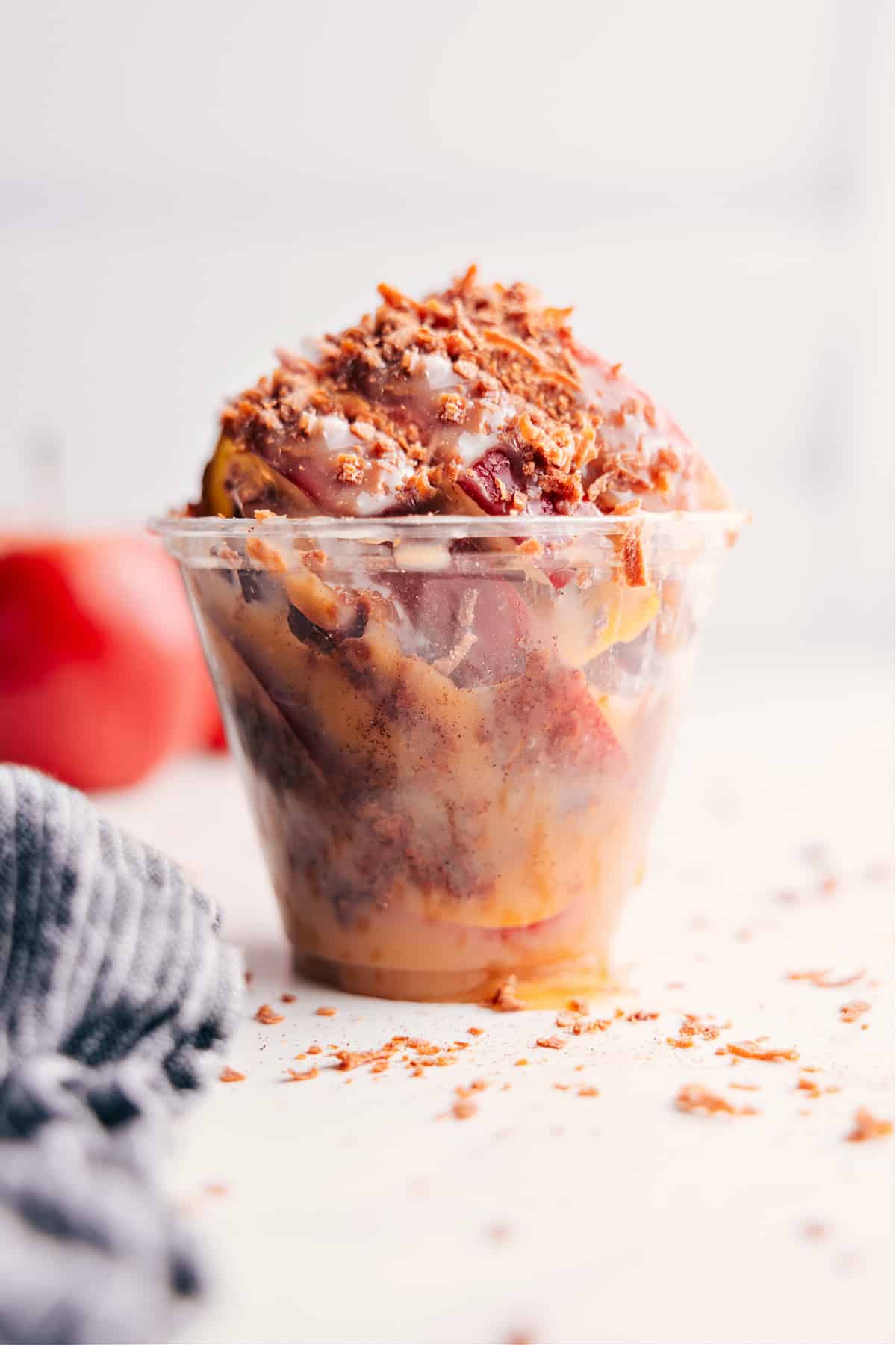 Caramel Apple Dessert Cups with a chocolate-caramel drizzle and toasted coconut on top.