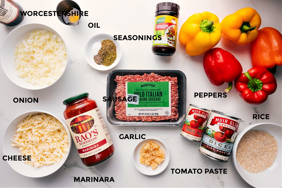 Ingredients In Italian Stuffed Peppers All the ingredients for Italian stuffed peppers prepped for easy assembly, including Worcestershire sauce, onion, cheese, marinara, seasonings, garlic, tomato paste, rice, and peppers.