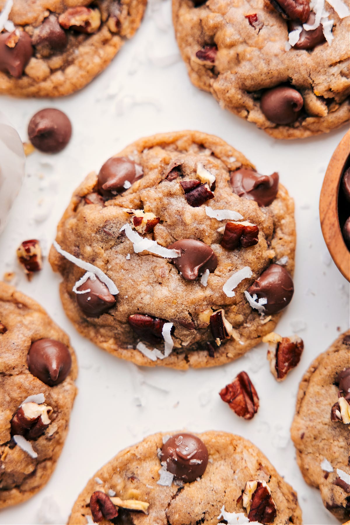 Cowboy Cookies Recipe with fresh coconut on top ready to be enjoyed.