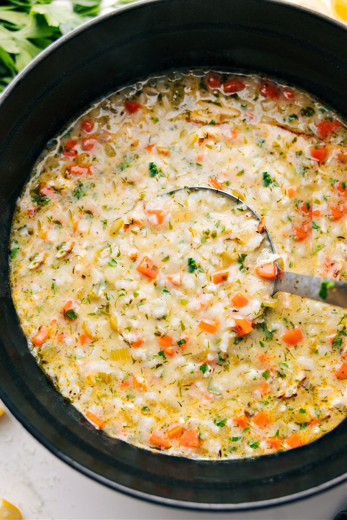 Greek lemon soup with chicken, rice, and vegetables in a bright lemony broth, one of these fall soup recipes.