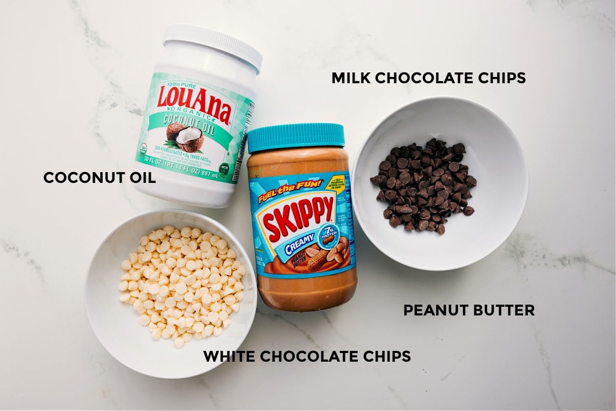 All the ingredients in this recipe prepped out for easy assembly including the oil, chocolate chips, and peanut butter.