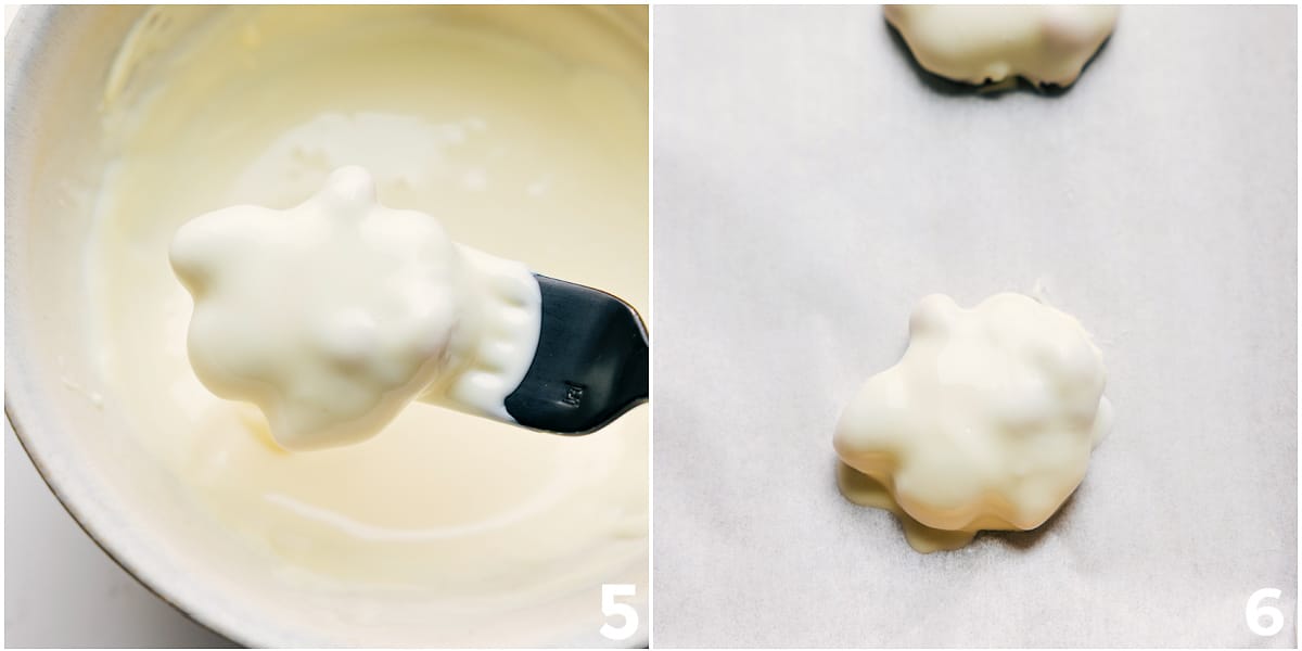The treat being dipped in white chocolate.