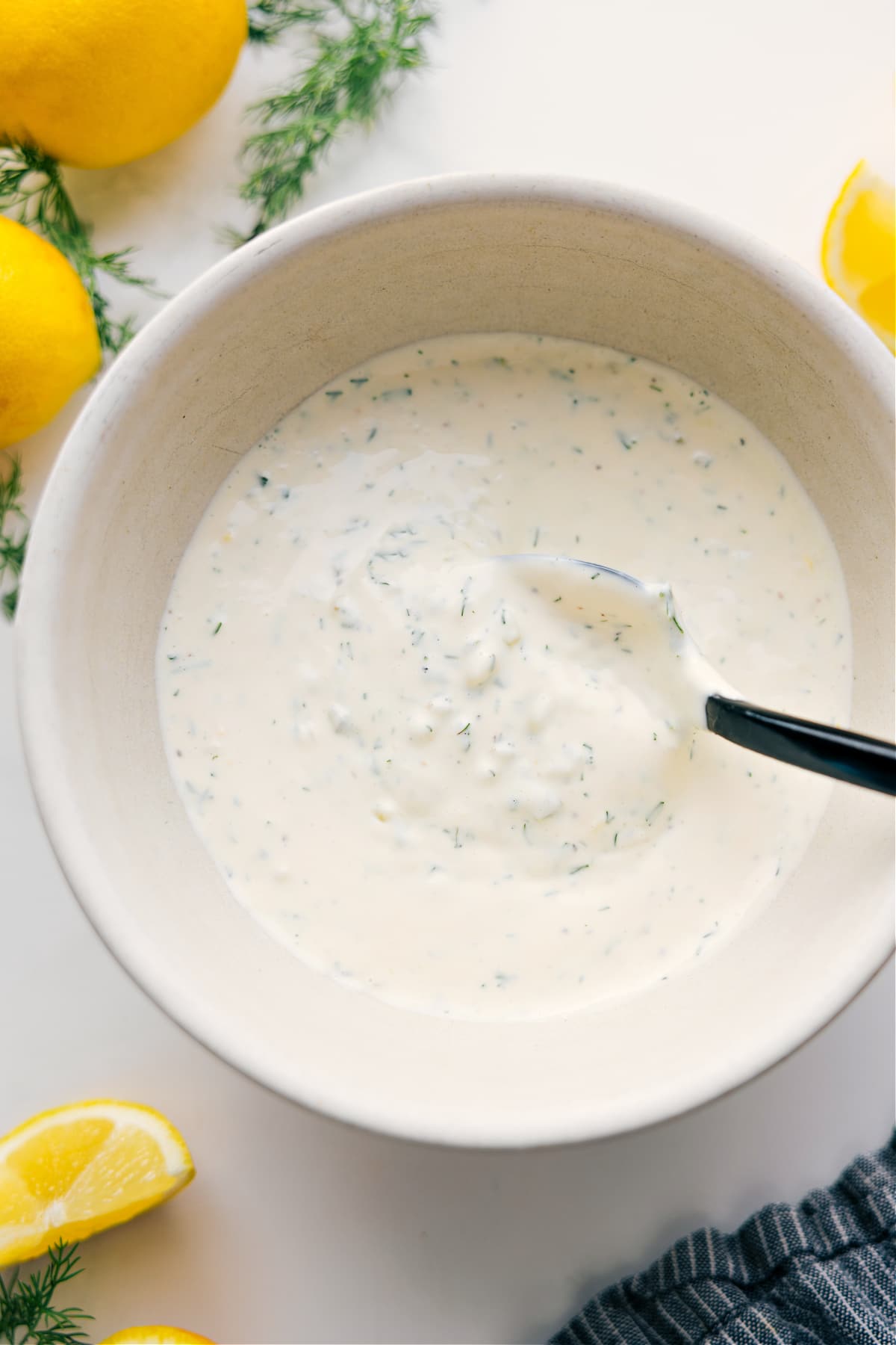 Attention all seafood lovers! Are you tired of bland and lackluster condiments served with your favorite seafood dishes? Look no further, because we are sharing our favorite tangy, zesty, and fresh Tartar Sauce recipe. With just a few simple ingredients, you can elevate your next fish and chips, crab cakes, or salmon burger to new heights. And the best part? It's super quick and easy to make and can be stored in the refrigerator for when you need it. Recipe via chelseasmessyapron #dip #dressing #best #easy #simple #tartar #sauce