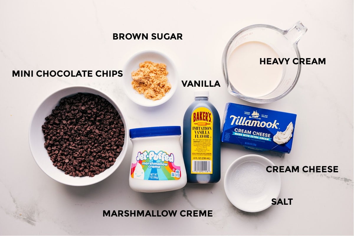 Ingrediens In Chocolate Chip Dip All the ingredients in this recipe prepped out for easy assembly including the chocolate, marshmallow creme, cream cheese, salt, vanilla, heavy cream, and brown sugar.