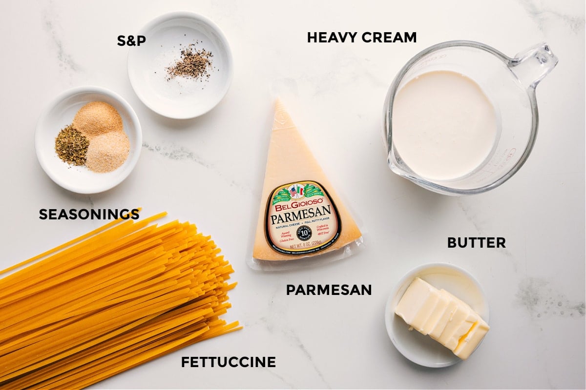 Ingredients In Olive Garden Fettuccine Alfredo Recipe All the ingredients in this recipe prepped out for easy assembly including the seasonings, fettuccine, parmesan, heavy cream, and butter.