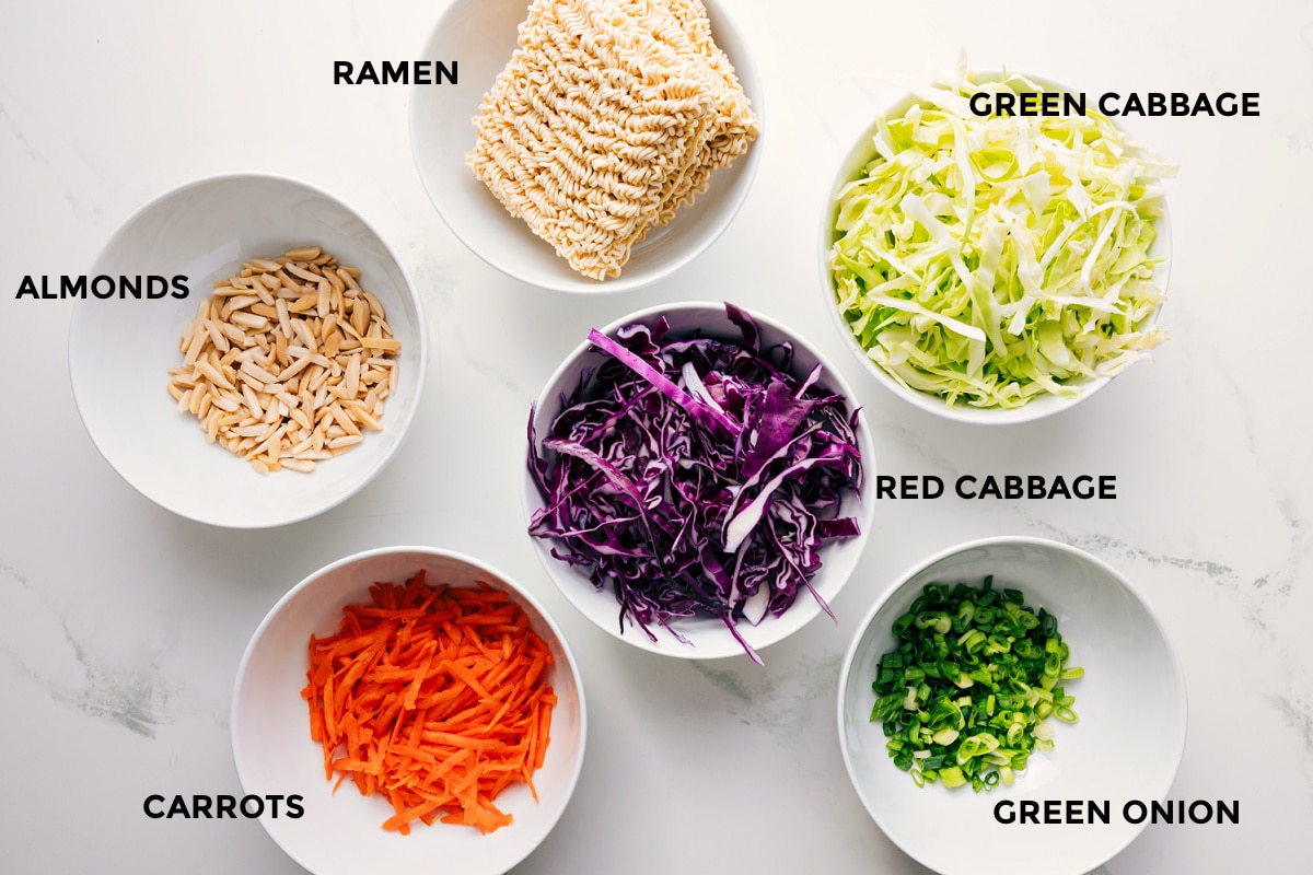 Ingredients In This Ramen Noodle Salad Recipe All the ingredients in this recipe prepped out for easy assembly including the almonds, carrots, cabbage, green onions, and ramen.