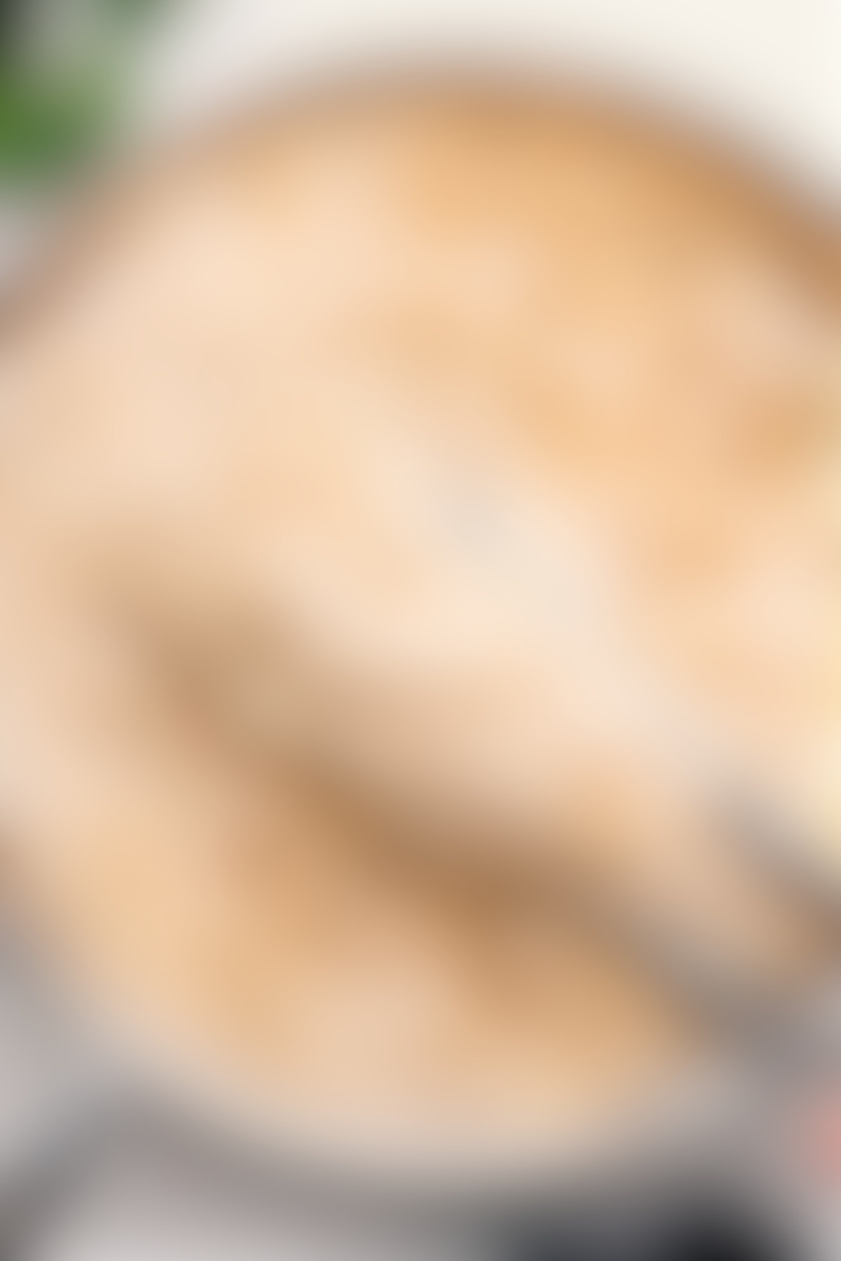 Creamy And Delicious Olive Garden Fettuccine Alfredo Olive Garden fettuccine alfredo in the pot with a big scoop coming out.