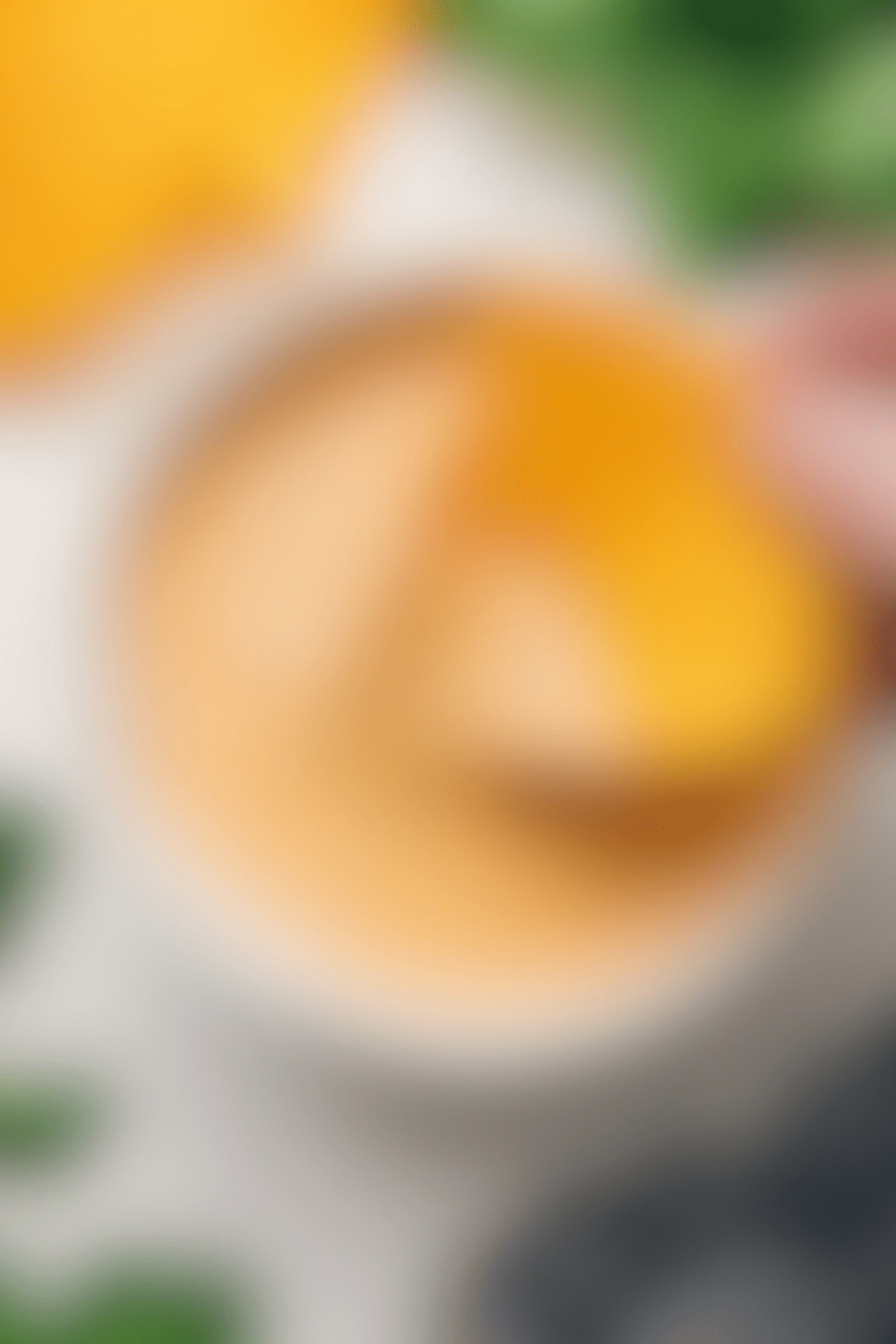 Copycat Queso Recipe From A Local Resturant Bajio queso recipe with a chip dipping in.