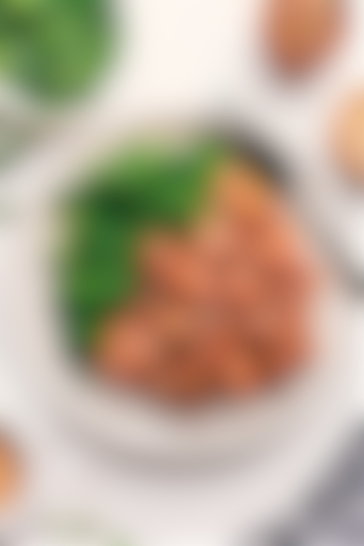 Panda Express Orange Chicken Panda Express orange chicken on a bed of rice with broccoli on the side.