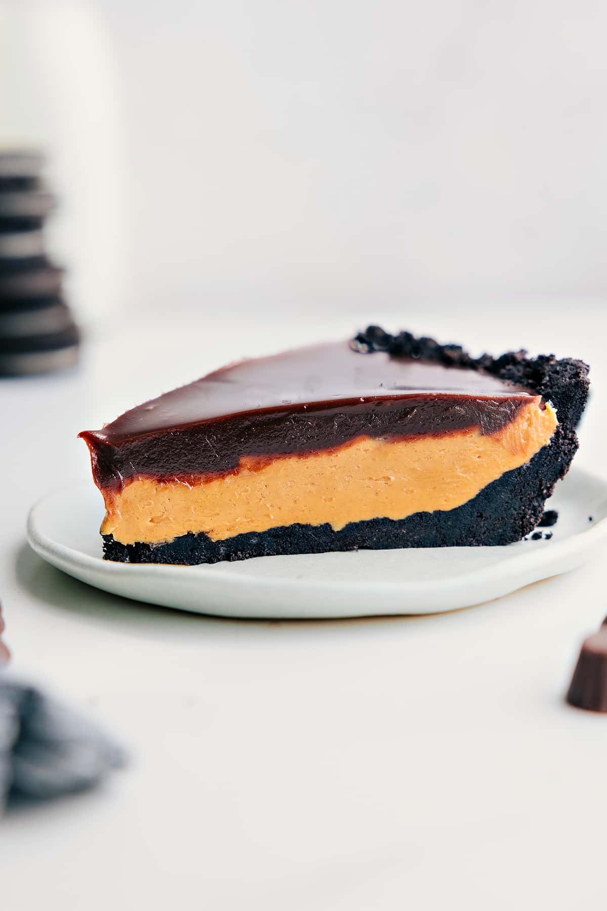 Slice Of This Chocolate Peanut Butter Pie Recipe Chocolate Peanut Butter Pie Recipe slice on a plate ready to be enjoyed.