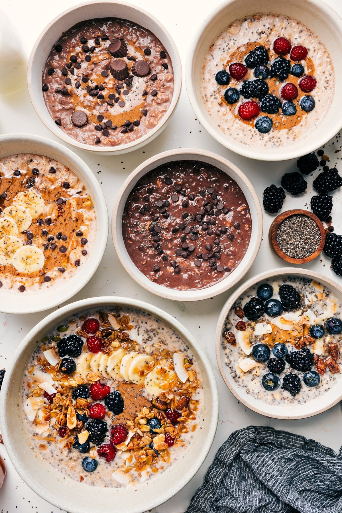 Overnight Oats Recipes showing different flavor options topped with fresh fruit, nuts, and other fun toppings.