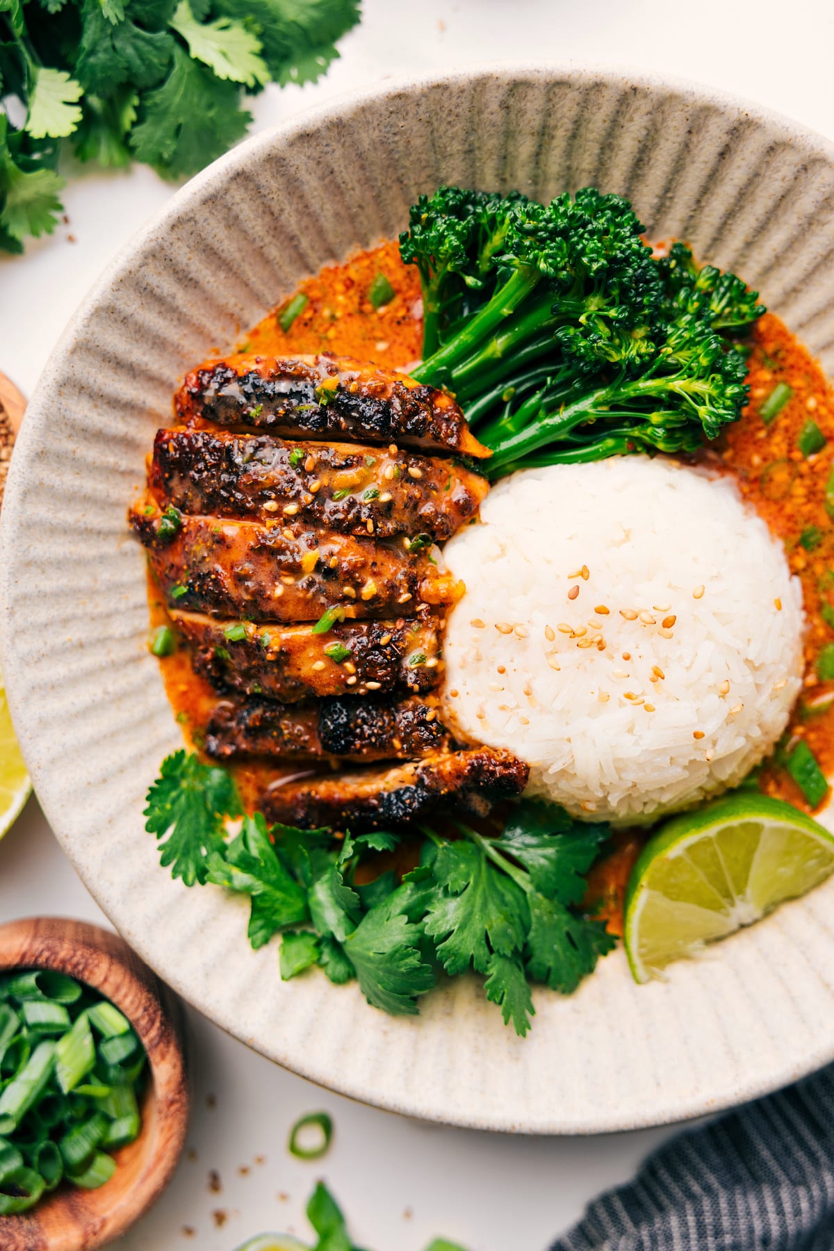 Chicken Broth Bowl with rice, broccoli, and sesame seeds.