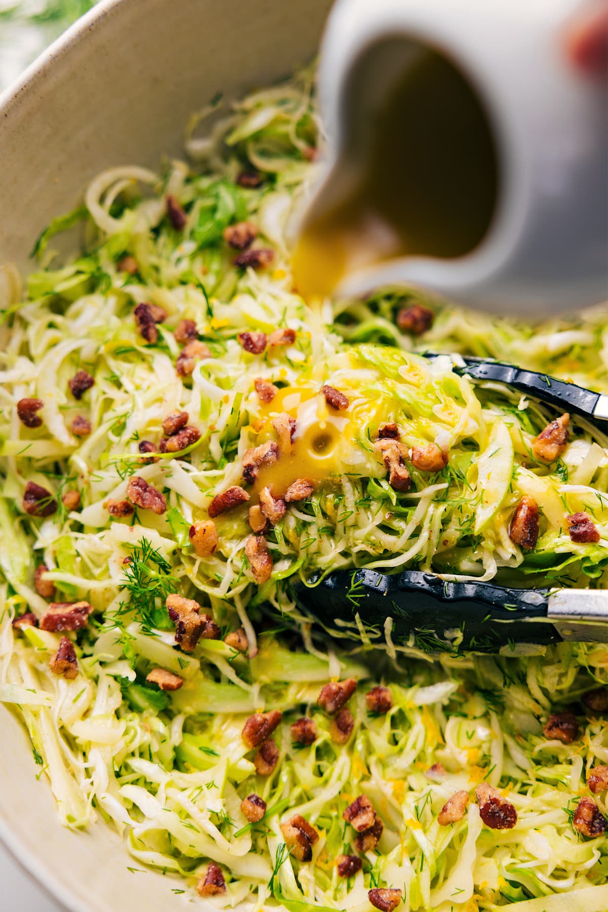 Apple Fennel Slaw with honey-Dijon dressing poured over the top.