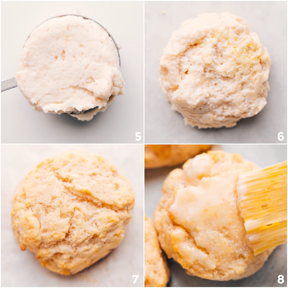 Biscuit dough scooped with a measuring cup, placed on a sheet pan, baked until golden, and brushed with melted butter.