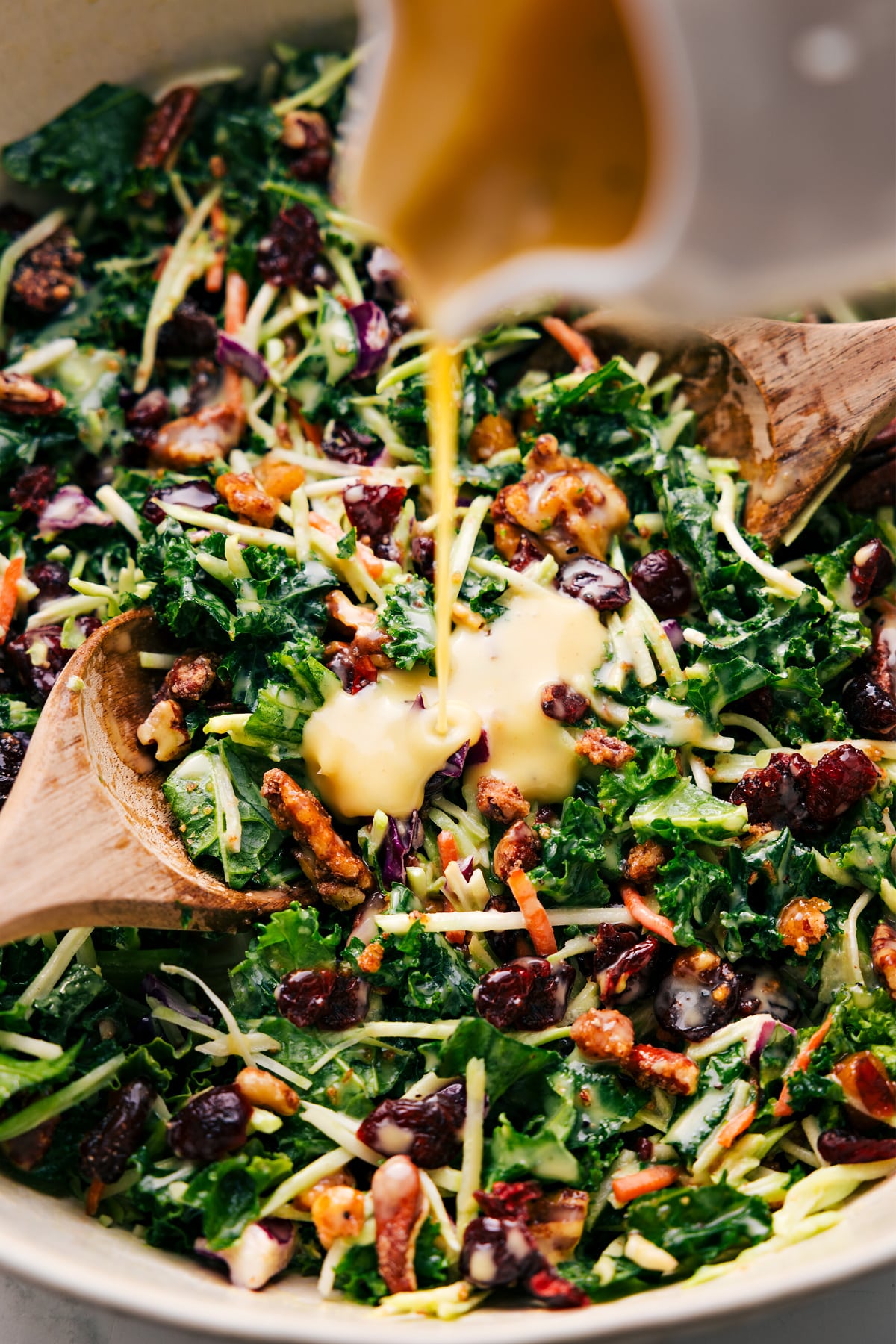 Honey Dijon dressing drizzled over a fresh salad.